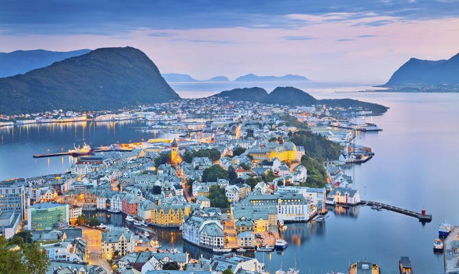 Image of norwegian city of Alesund during twilight blue hour.